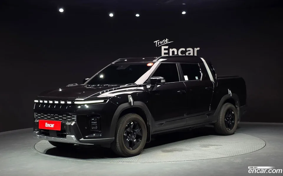 KG Mobility Musso EV AWD 2025 — photo 1, buy with delivery to Moscow