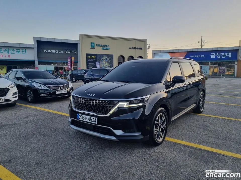 Kia Carnival 9 2023 — photo 1, buy with delivery to Moscow
