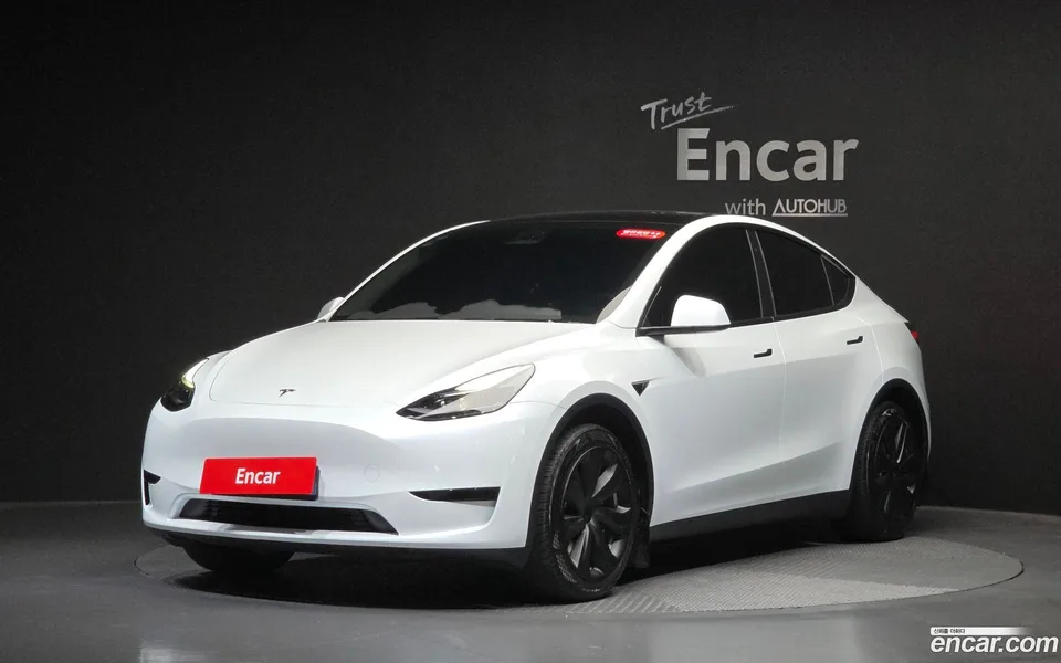 Tesla Model Y RWD 2024 — photo 1, buy with delivery to Moscow