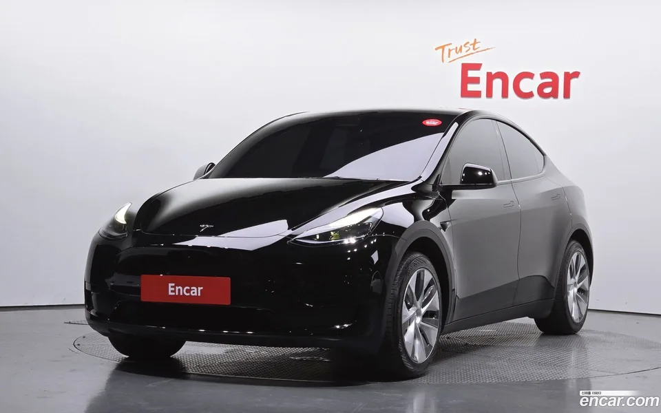 Tesla Model Y RWD 2023 — photo 1, buy with delivery to Moscow