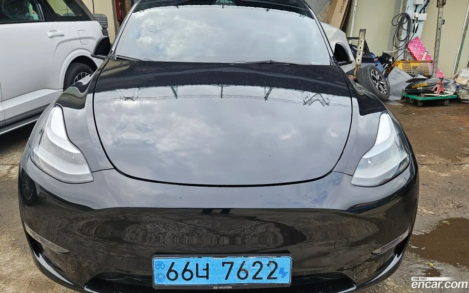 Tesla Model Y AWD 2023 — photo 1, buy with delivery to Moscow