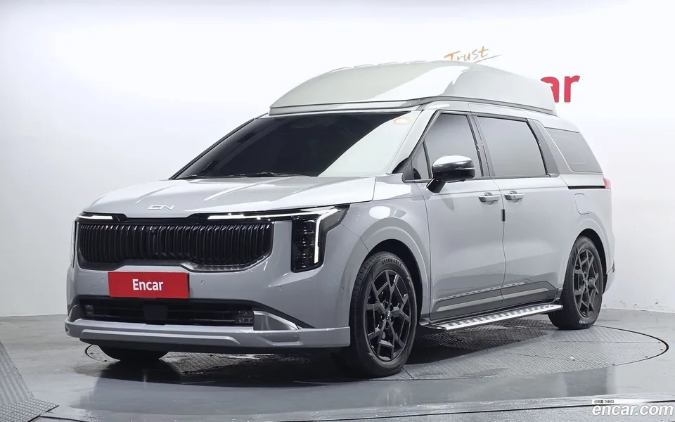 Kia Carnival HEV 9 () 2025 — photo 1, buy with delivery to Moscow