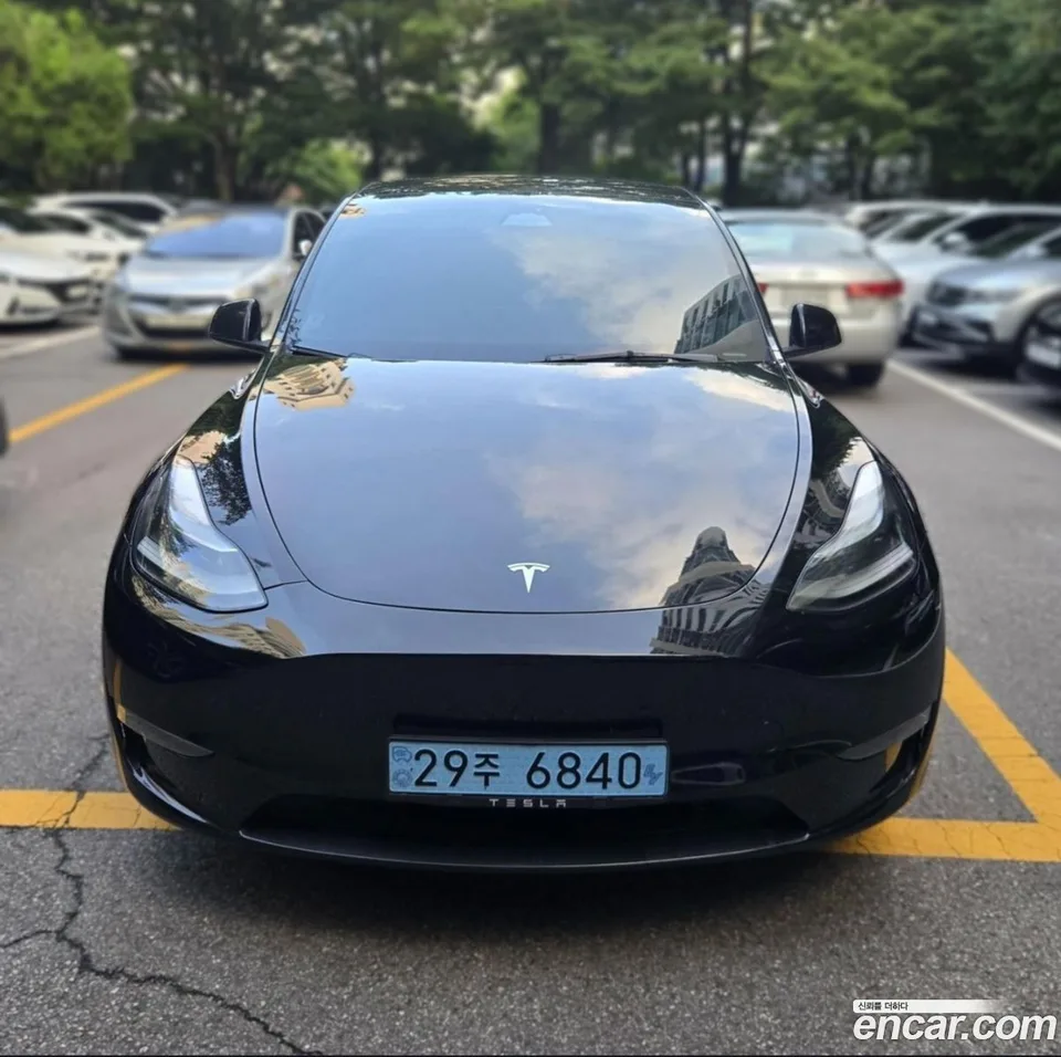 Tesla Model Y AWD 2023 — photo 1, buy with delivery to Moscow