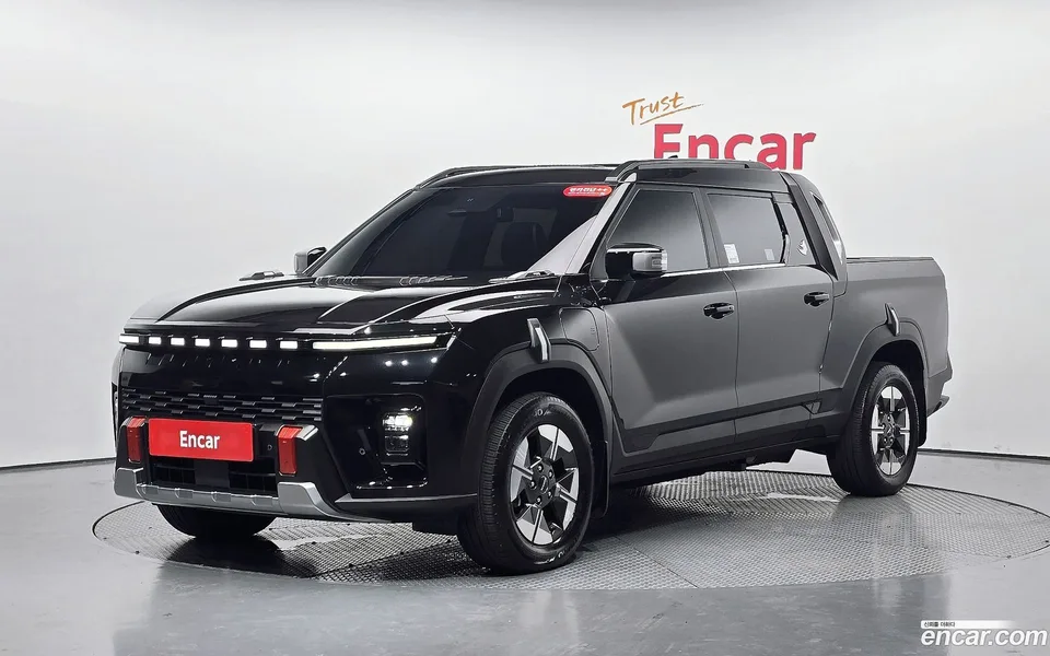 KG Mobility Musso EV MX 2025 — photo 1, buy with delivery to Moscow