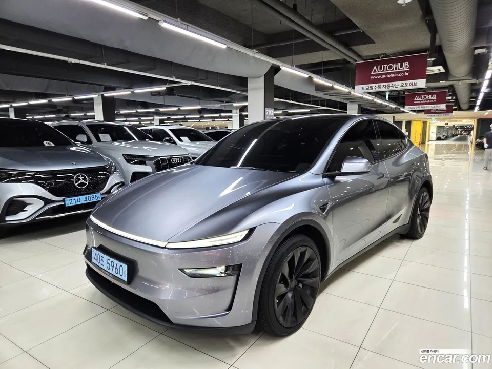 Tesla Model Y AWD 2025 — photo 1, buy with delivery to Moscow