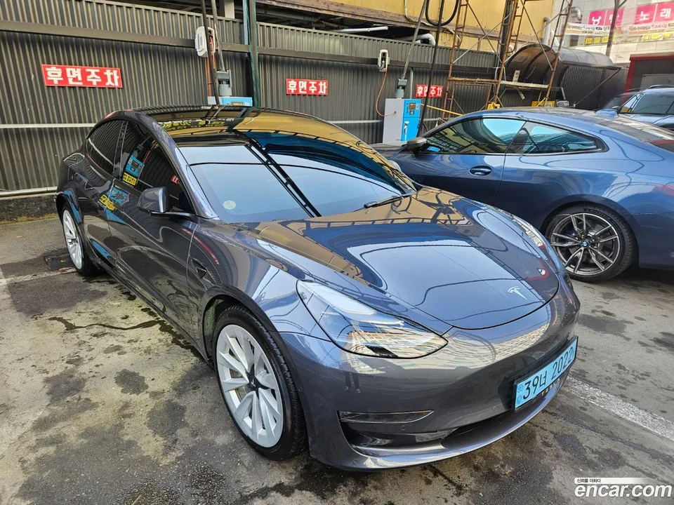 Tesla Model 3 AWD 2022 — photo 1, buy with delivery to Moscow