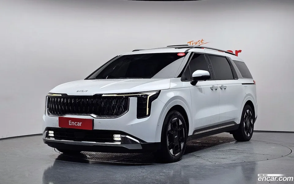 Kia Carnival HEV 7 2025 — photo 1, buy with delivery to Moscow
