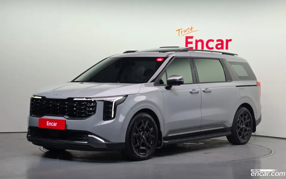 Kia Carnival HEV 7 2024 — photo 1, buy with delivery to Moscow