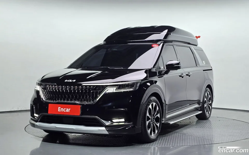 Kia Carnival 9 2023 — photo 1, buy with delivery to Moscow