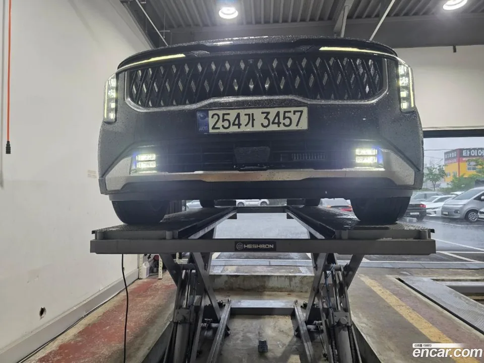 Kia Carnival HEV 7 2024 — photo 1, buy with delivery to Moscow