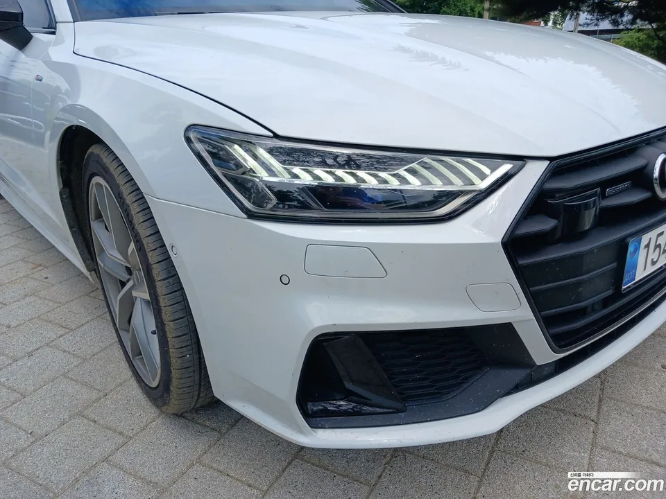 Audi A7 (4K) 55 TFSI 2023 — photo 1, buy with delivery to Moscow