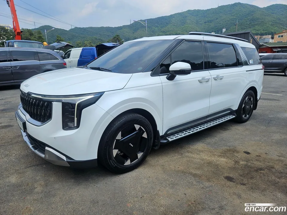 Kia Carnival HEV 9 2024 — photo 1, buy with delivery to Moscow