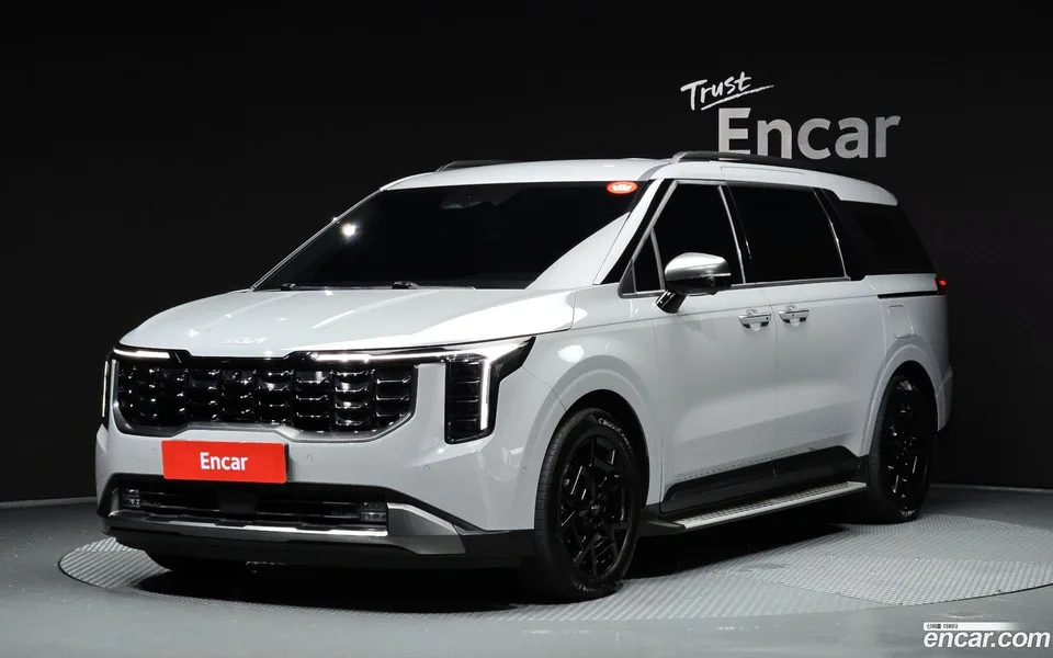 Kia Carnival HEV 7 2024 — photo 1, buy with delivery to Moscow