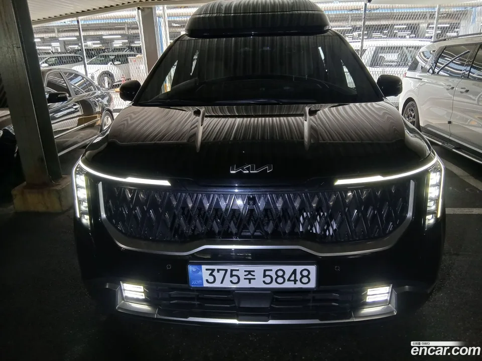 Kia Carnival HEV 9 2024 — photo 1, buy with delivery to Moscow