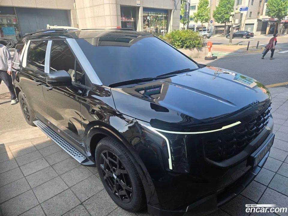 Kia Carnival HEV 9 X Line 2026 — photo 1, buy with delivery to Moscow
