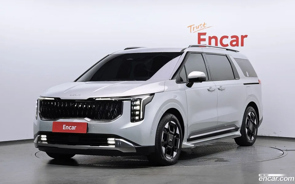 Kia Carnival HEV 9 2024 — photo 1, buy with delivery to Moscow