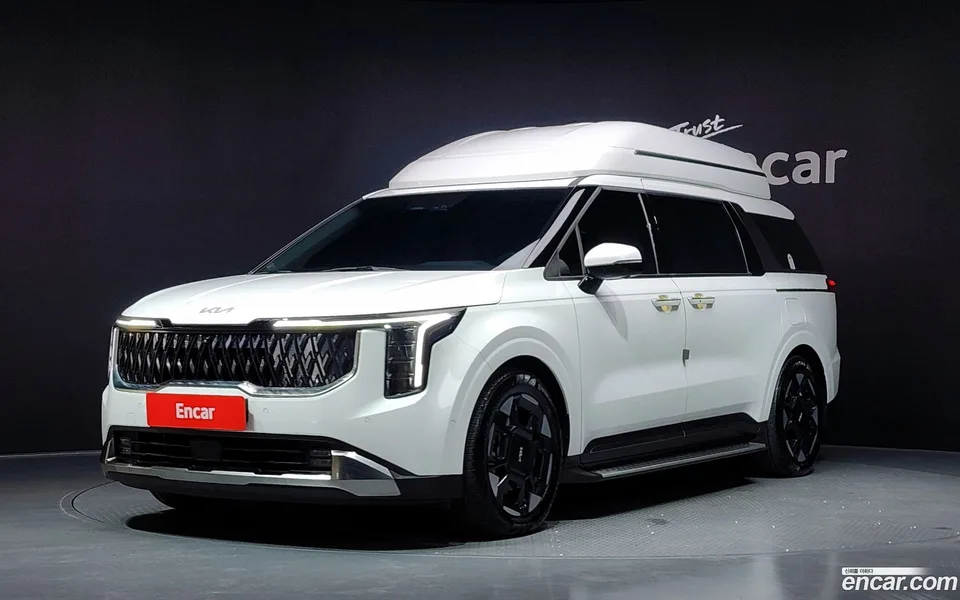 Kia Carnival 7 2024 — photo 1, buy with delivery to Moscow