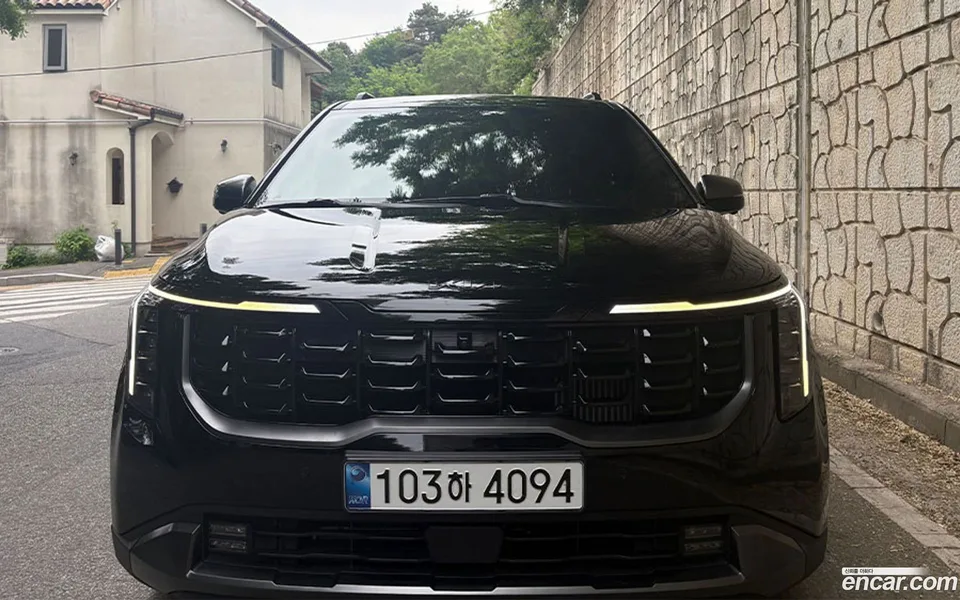 Kia Carnival HEV 9 2024 — photo 1, buy with delivery to Moscow
