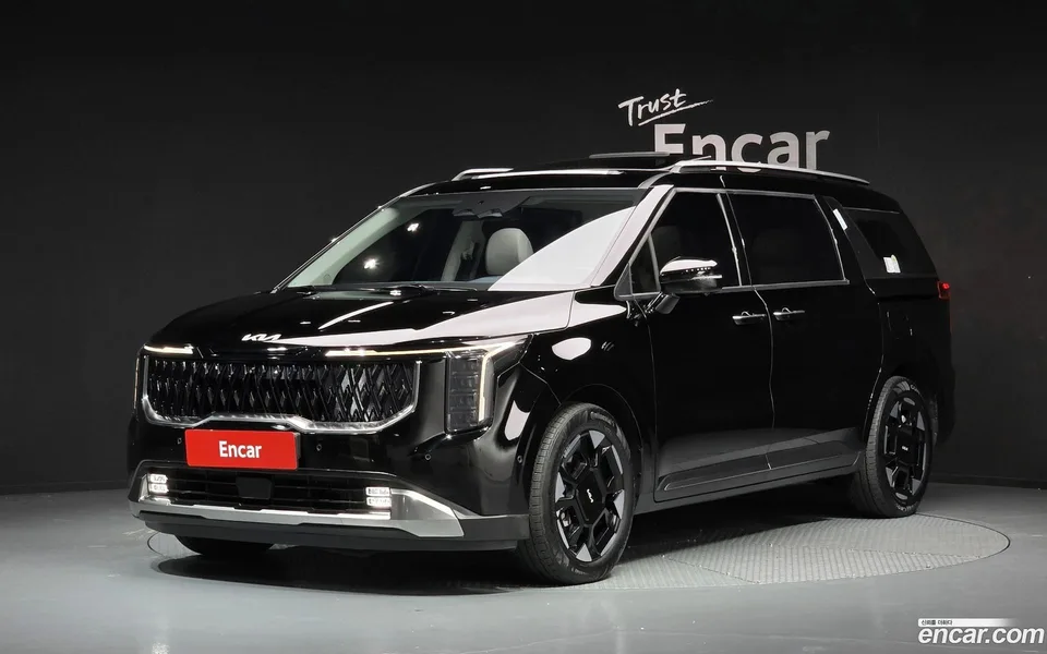 Kia Carnival HEV 7 2024 — photo 1, buy with delivery to Moscow