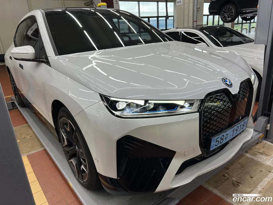 BMW iX xDrive50 2023 — photo 1, buy with delivery to Moscow