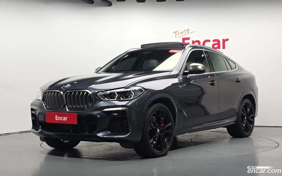 BMW X6 M50i 2022 — photo 1, buy with delivery to Moscow