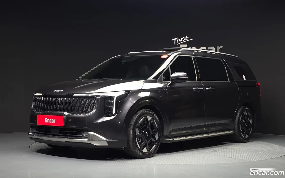 Kia Carnival 7 2024 — photo 1, buy with delivery to Moscow