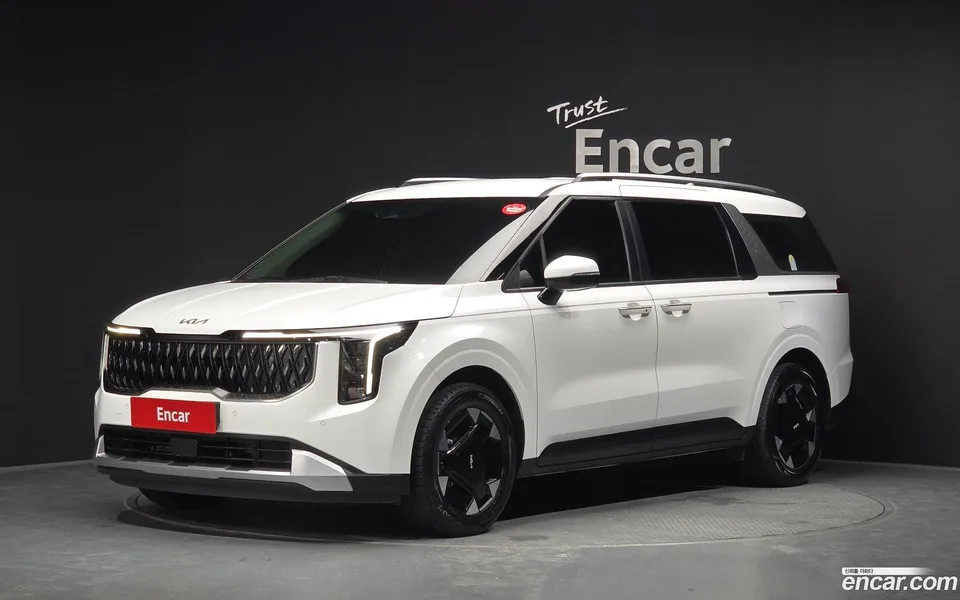 Kia Carnival HEV 9 2024 — photo 1, buy with delivery to Moscow
