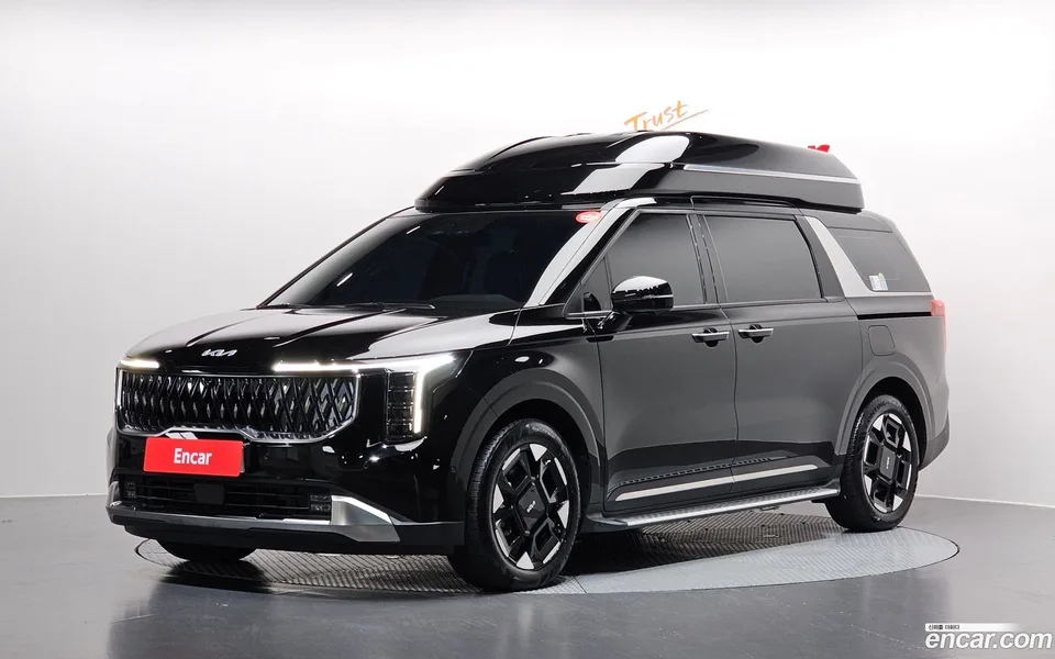 Kia Carnival HEV 9 2024 — photo 1, buy with delivery to Moscow