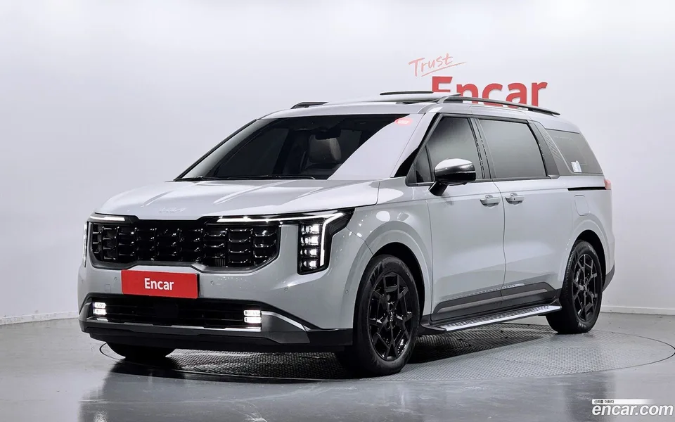 Kia Carnival HEV 7 2024 — photo 1, buy with delivery to Moscow