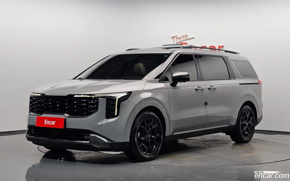 Kia Carnival HEV 7 2025 — photo 1, buy with delivery to Moscow