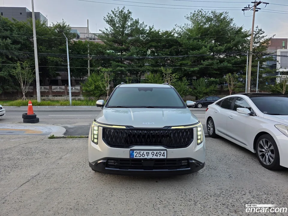 Kia Carnival HEV 9 2024 — photo 1, buy with delivery to Moscow