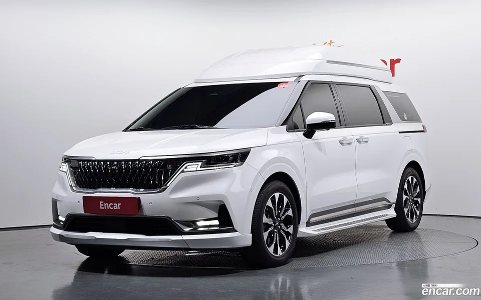 Kia Carnival 7 2023 — photo 1, buy with delivery to Moscow