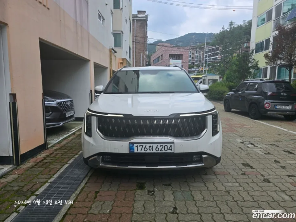Kia Carnival HEV 9 2024 — photo 1, buy with delivery to Moscow
