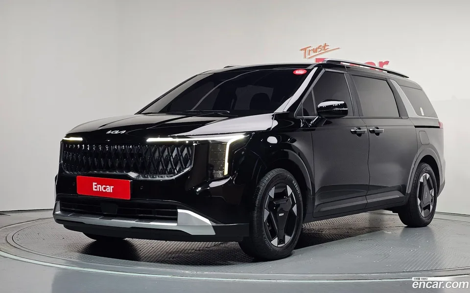 Kia Carnival HEV 9 2024 — photo 1, buy with delivery to Moscow