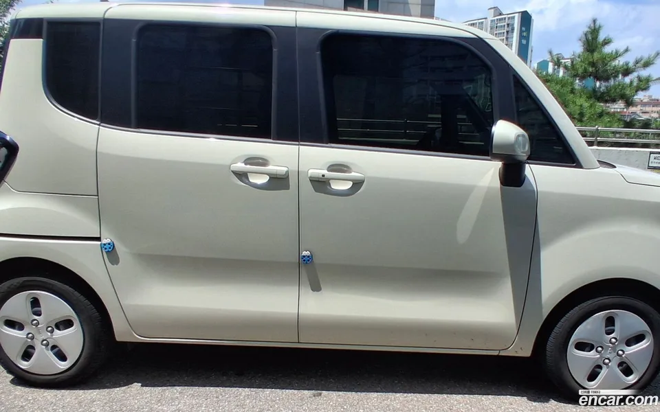 Kia Ray EV 2024 — photo 1, buy with delivery to Moscow