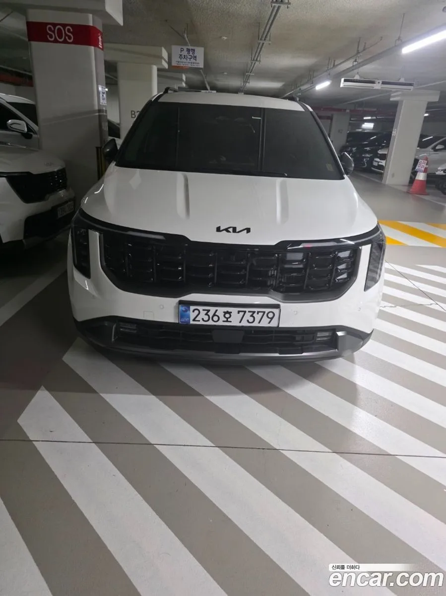 Kia Carnival HEV 9 X Line 2026 — photo 1, buy with delivery to Moscow