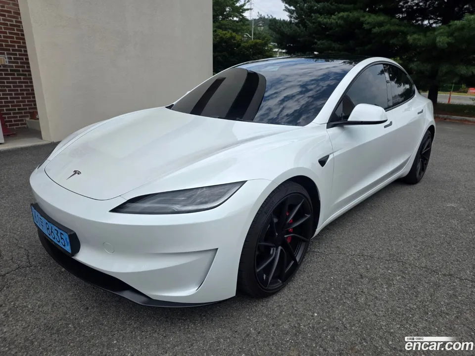 Tesla Model 3 AWD 2024 — photo 1, buy with delivery to Moscow