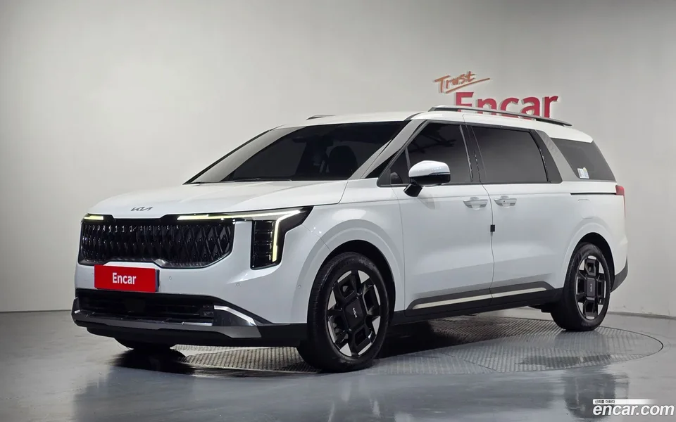 Kia Carnival HEV 7 2024 — photo 1, buy with delivery to Moscow