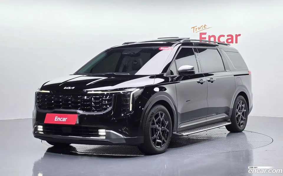 Kia Carnival 7 2023 — photo 1, buy with delivery to Moscow