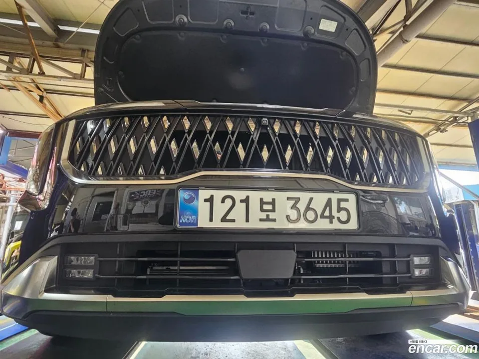 Kia Carnival HEV 4 2025 — photo 1, buy with delivery to Moscow