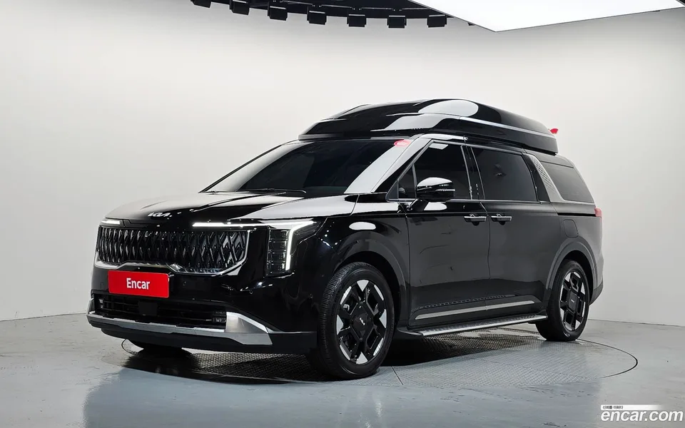 Kia Carnival HEV 9 2024 — photo 1, buy with delivery to Moscow