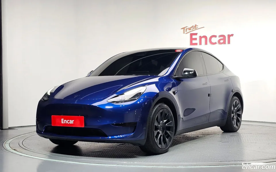 Tesla Model Y RWD 2023 — photo 1, buy with delivery to Moscow