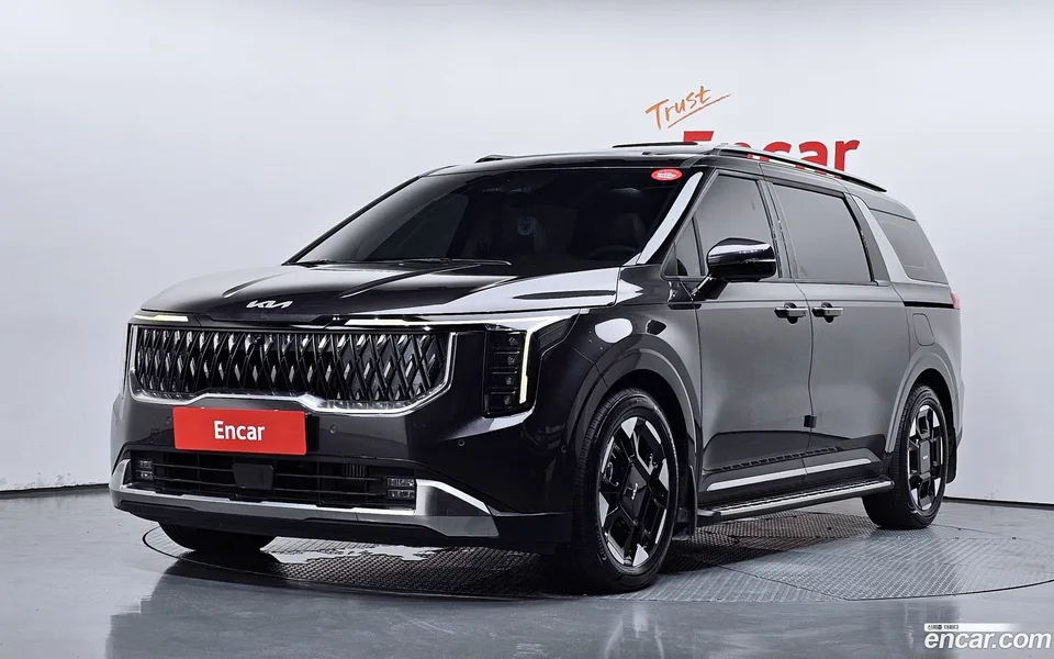 Kia Carnival 7 2024 — photo 1, buy with delivery to Moscow