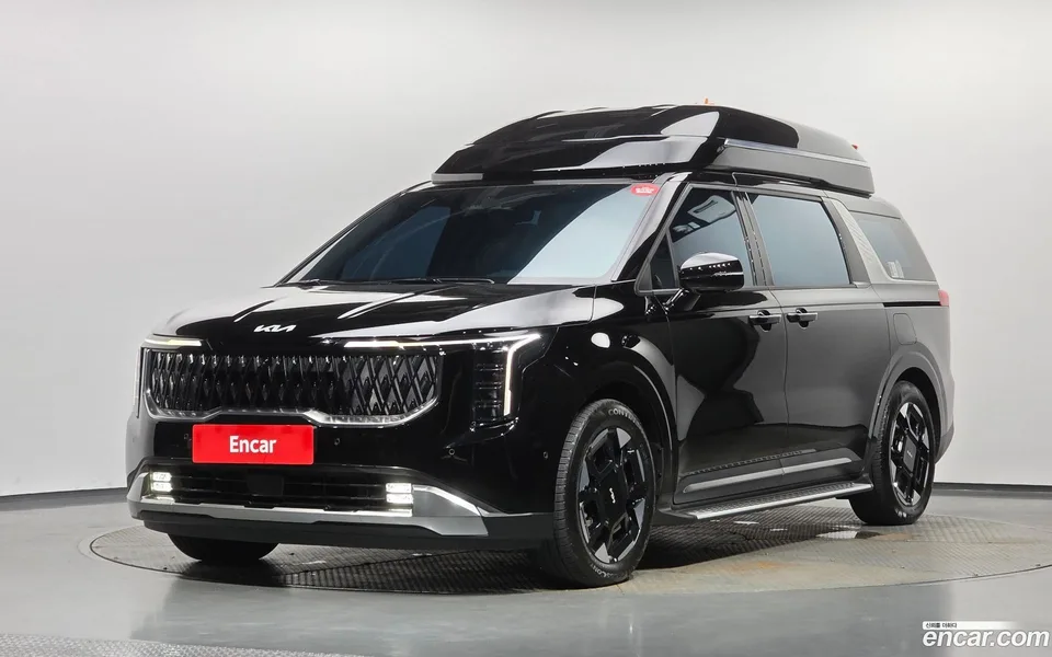 Kia Carnival HEV 9 2024 — photo 1, buy with delivery to Moscow