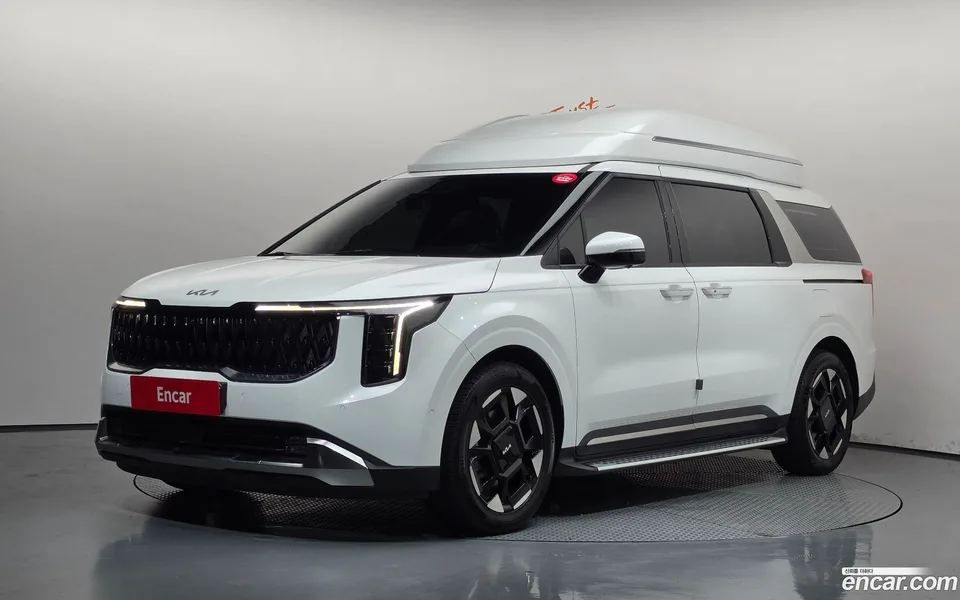 Kia Carnival HEV 9 2024 — photo 1, buy with delivery to Moscow