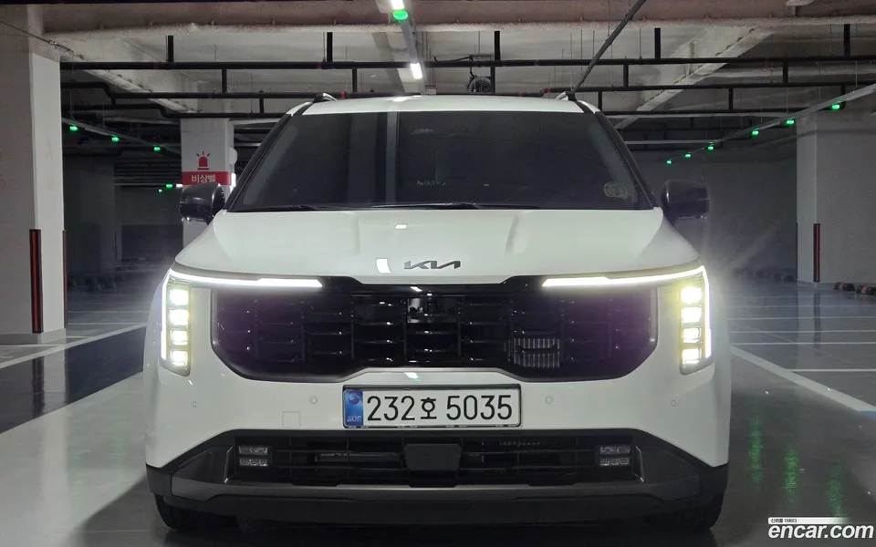 Kia Carnival HEV 7 X Line 2025 — photo 1, buy with delivery to Moscow