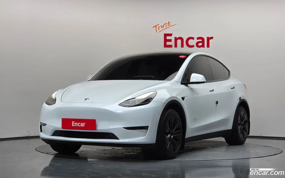 Tesla Model Y AWD 2024 — photo 1, buy with delivery to Moscow